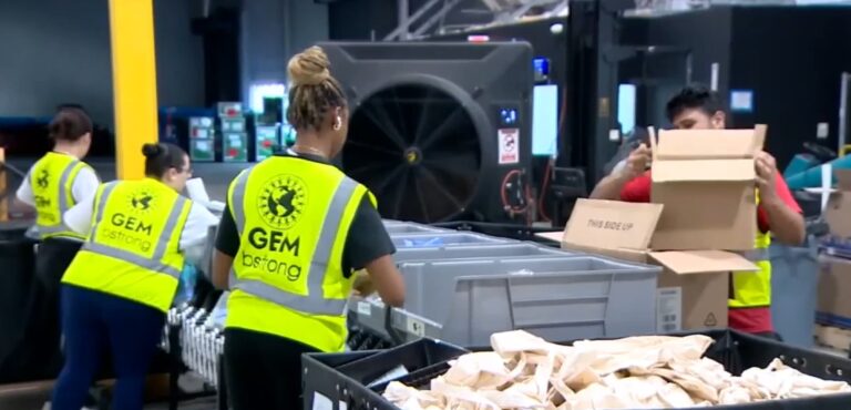 Volunteers with the Global Empowerment Mission in Doral pack aid boxes to deliver to the Caribbean ahead of Tropical Storm Melissa